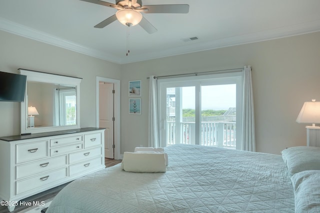 876 Villas Dr, North Topsail Beach, NC 28460 - bedroom with access to exterior, ornamental molding, multiple windows, dark wood finished floors, and a ceiling fan