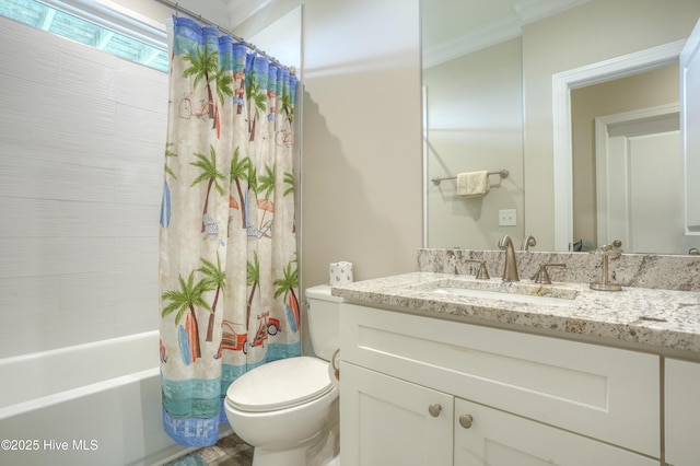 876 Villas Dr, North Topsail Beach, NC 28460 - full bathroom featuring vanity, toilet, shower / bath combo with shower curtain, and ornamental molding