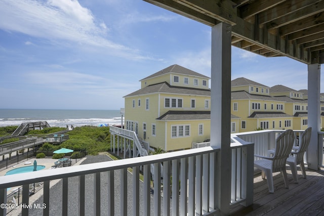 876 Villas Dr, North Topsail Beach, NC 28460 - wooden terrace featuring a water view