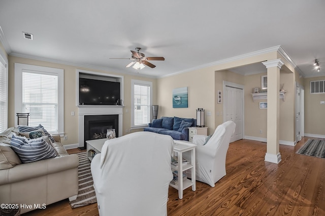 2 Clam Shell Ln Unit 6, Carolina Beach, NC 28428 - living area with ceiling fan, crown molding, ornate columns, wood finished floors, and baseboards