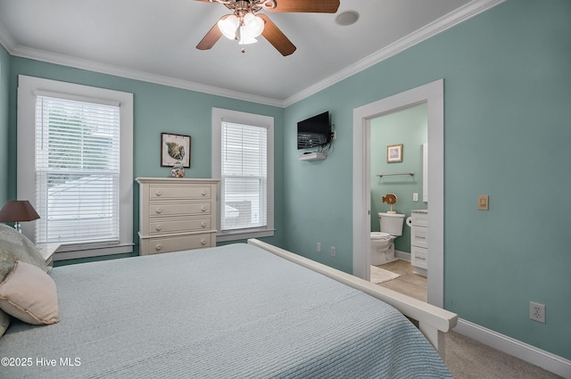 2 Clam Shell Ln Unit 6, Carolina Beach, NC 28428 - carpeted bedroom featuring ornamental molding, baseboards, connected bathroom, and a ceiling fan