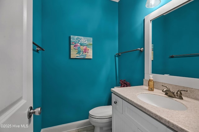 2 Clam Shell Ln Unit 6, Carolina Beach, NC 28428 - bathroom featuring vanity and toilet