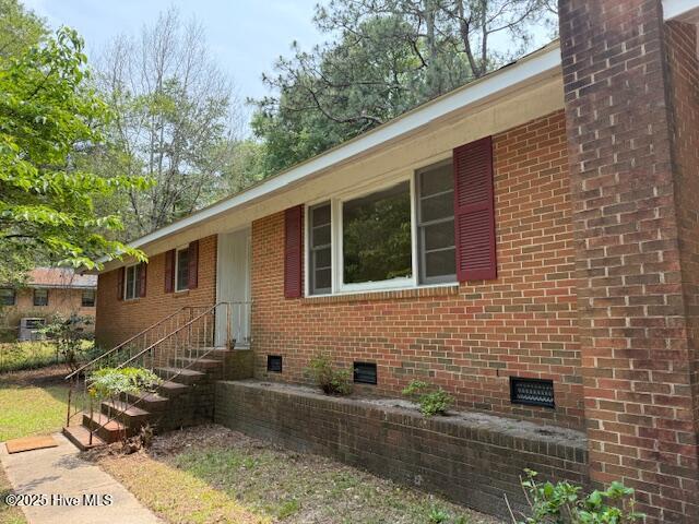 430 W Rhode Island Ave, Southern Pines, NC 28387 - ranch-style home with crawl space and brick siding
