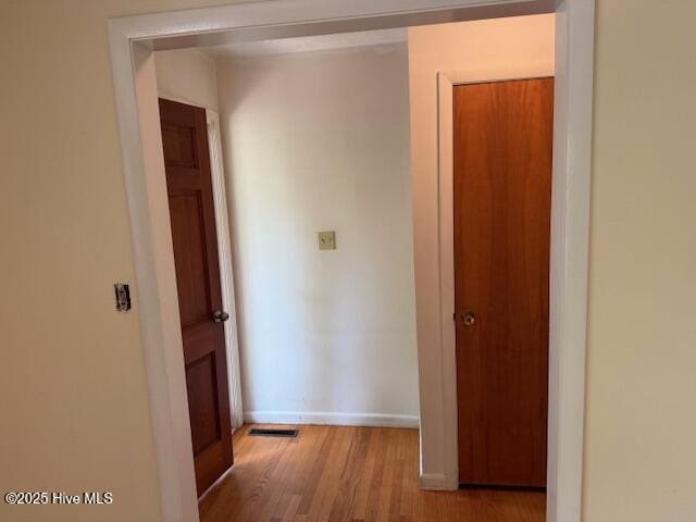 430 W Rhode Island Ave, Southern Pines, NC 28387 - hall with wood finished floors and baseboards