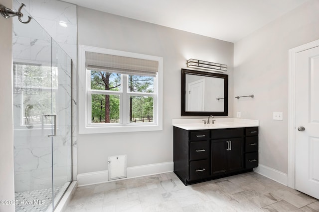 103 Schever Rd, West End, NC 27376 - bathroom featuring baseboards, vanity, and a marble finish shower