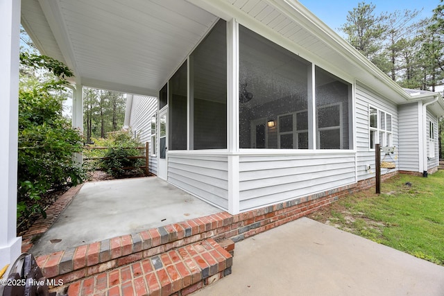 103 Schever Rd, West End, NC 27376 - view of patio / terrace featuring a sunroom