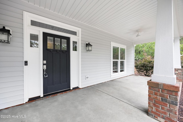 103 Schever Rd, West End, NC 27376 - doorway to property with a ceiling fan and a porch