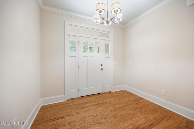 103 Schever Rd, West End, NC 27376 - entryway featuring a chandelier, crown molding, light wood finished floors, and baseboards