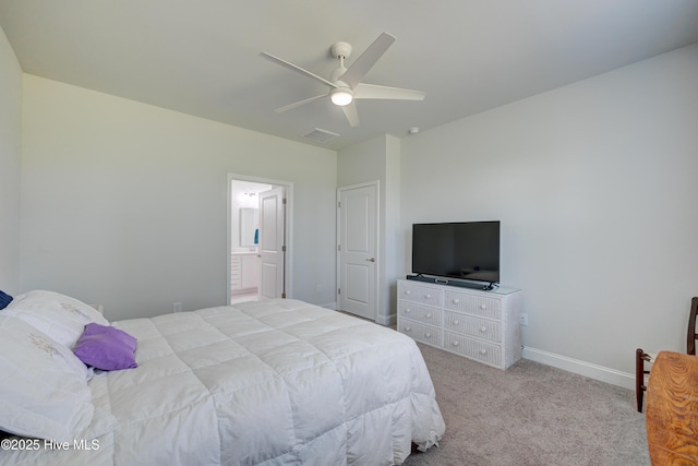 1337 Fence Post Ln, Carolina Shores, NC 28467 - bedroom with carpet, baseboards, ceiling fan, and ensuite bath