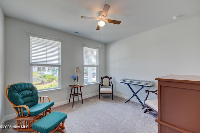 1337 Fence Post Ln, Carolina Shores, NC 28467 - sitting room with light colored carpet, baseboards, and ceiling fan