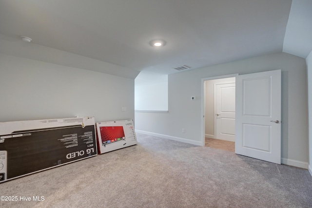 1337 Fence Post Ln, Carolina Shores, NC 28467 - additional living space featuring vaulted ceiling, carpet flooring, and baseboards