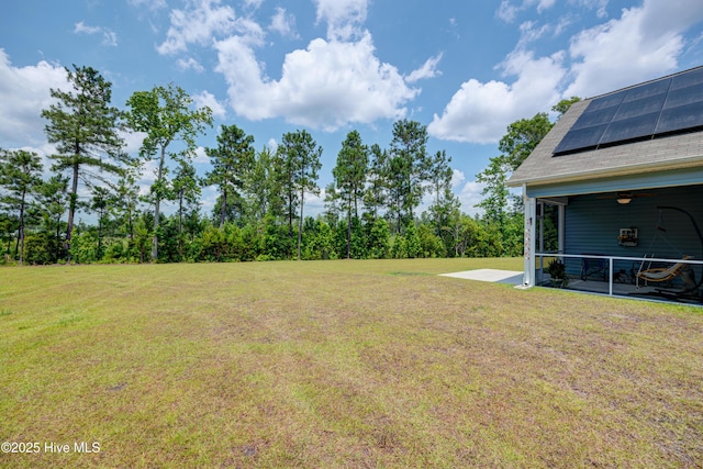 1337 Fence Post Ln, Carolina Shores, NC 28467 - view of green lawn with a patio area