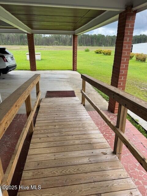 214 NC Highway 561 E, Ahoskie, NC 27910 - wooden deck with a yard
