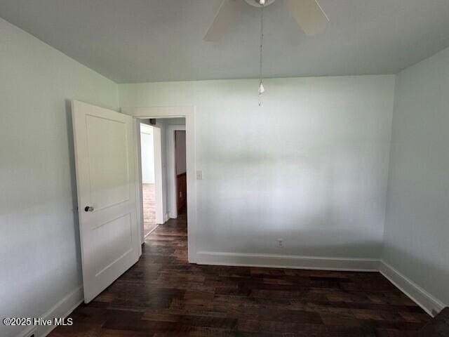 214 NC Highway 561 E, Ahoskie, NC 27910 - unfurnished room featuring ceiling fan, dark wood-style flooring, and baseboards