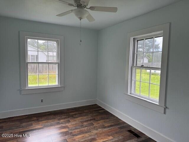 214 NC Highway 561 E, Ahoskie, NC 27910 - unfurnished room featuring healthy amount of natural light and baseboards