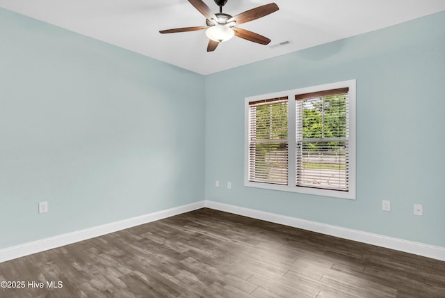 1120 Beasley Rd, Wilmington, NC 28409 - empty room featuring a ceiling fan and dark wood-type flooring