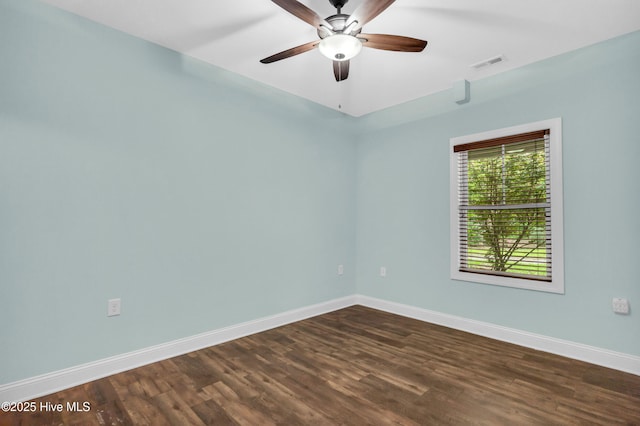 1120 Beasley Rd, Wilmington, NC 28409 - unfurnished room featuring dark wood-style floors and a ceiling fan