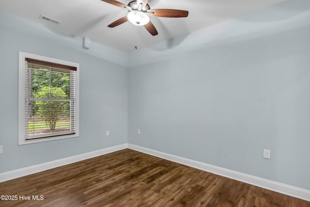 1120 Beasley Rd, Wilmington, NC 28409 - spare room with dark wood-type flooring and ceiling fan