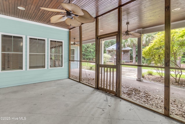 1120 Beasley Rd, Wilmington, NC 28409 - unfurnished sunroom with a ceiling fan and plenty of natural light