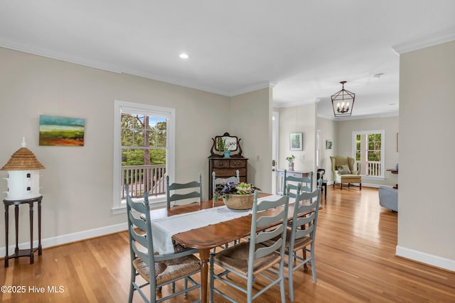 505 Rivage Promenade, Wilmington, NC 28412 - dining room with crown molding, light wood-type flooring, a chandelier, and recessed lighting