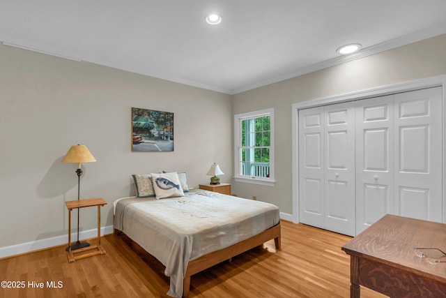 505 Rivage Promenade, Wilmington, NC 28412 - bedroom with light wood finished floors, crown molding, a closet, and recessed lighting
