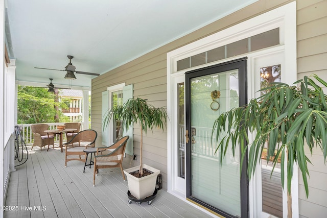 505 Rivage Promenade, Wilmington, NC 28412 - deck with ceiling fan and outdoor dining space
