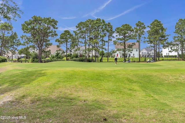 505 Rivage Promenade, Wilmington, NC 28412 - view of green lawn featuring view of golf course and a residential view