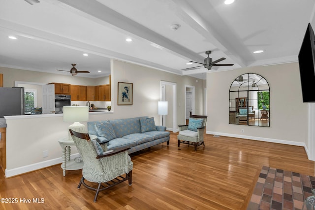 505 Rivage Promenade, Wilmington, NC 28412 - living room with ceiling fan, healthy amount of natural light, light wood-style flooring, recessed lighting, and beam ceiling