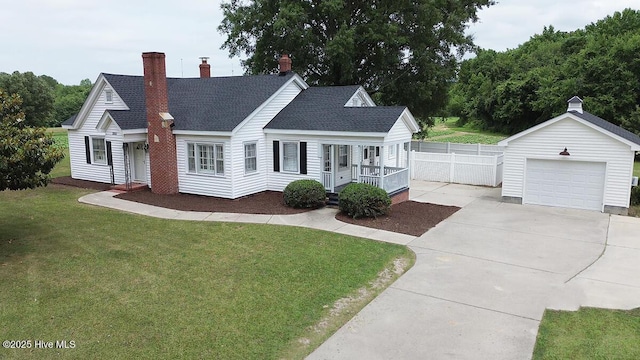 3081 S Browntown Rd, Rocky Mount, NC 27804 - view of front facade with roof with shingles, concrete driveway, a chimney, a porch, and an outbuilding