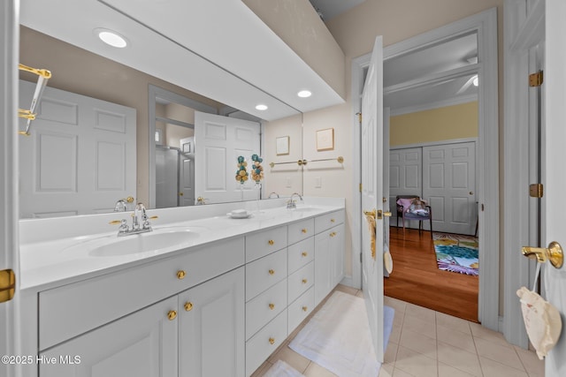 155 Mckenzie Rd E, Pinehurst, NC 28374 - full bath featuring double vanity, tile patterned flooring, and recessed lighting