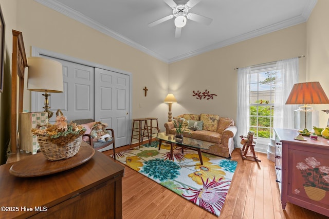155 Mckenzie Rd E, Pinehurst, NC 28374 - living area with ornamental molding, light wood-style floors, and a ceiling fan