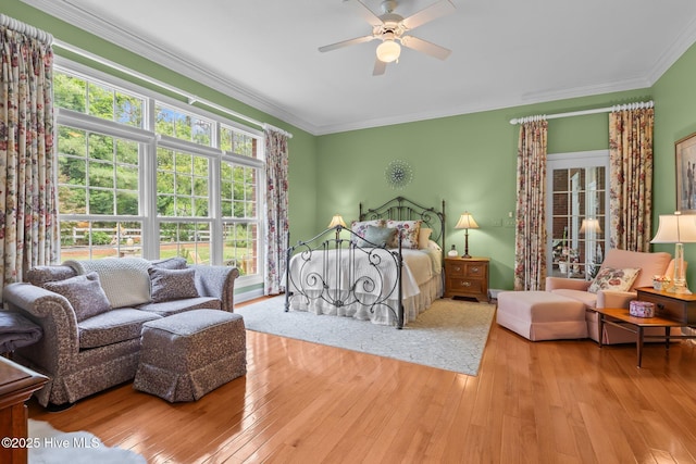 155 Mckenzie Rd E, Pinehurst, NC 28374 - bedroom featuring wood-type flooring, ornamental molding, and ceiling fan