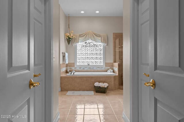 155 Mckenzie Rd E, Pinehurst, NC 28374 - full bathroom with a garden tub, tile patterned floors, and a stall shower