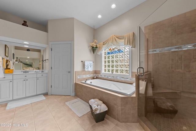 155 Mckenzie Rd E, Pinehurst, NC 28374 - full bath featuring vanity, a bath, a stall shower, and tile patterned flooring