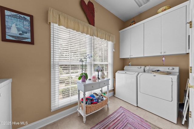 155 Mckenzie Rd E, Pinehurst, NC 28374 - laundry room featuring washer and dryer, cabinet space, and baseboards