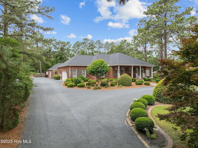155 Mckenzie Rd E, Pinehurst, NC 28374 - single story home with a garage and driveway