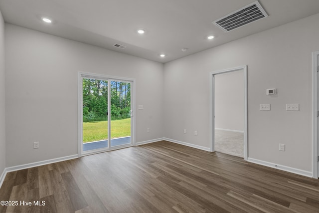 258 Arnette Dr Unit 81B, Ocean Isle Beach, NC 28469 - empty room with dark wood-type flooring and recessed lighting