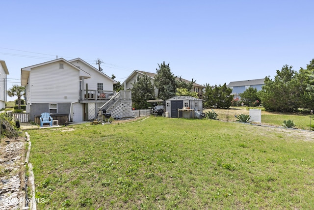 805 Carolina Beach Ave N, Carolina Beach, NC 28428 - view of green lawn featuring a wooden deck and stairs