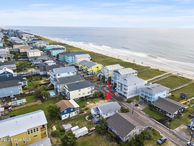 805 Carolina Beach Ave N, Carolina Beach, NC 28428 - kitchen with open shelves, washer / clothes dryer, appliances with stainless steel finishes, white cabinetry, and light wood finished floors