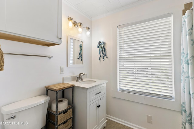805 Carolina Beach Ave N, Carolina Beach, NC 28428 - full bath with vanity, toilet, ornamental molding, and baseboards