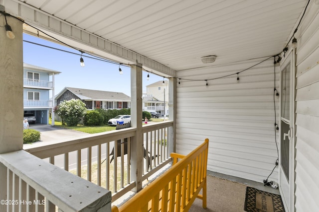 805 Carolina Beach Ave N, Carolina Beach, NC 28428 - covered porch with a residential view