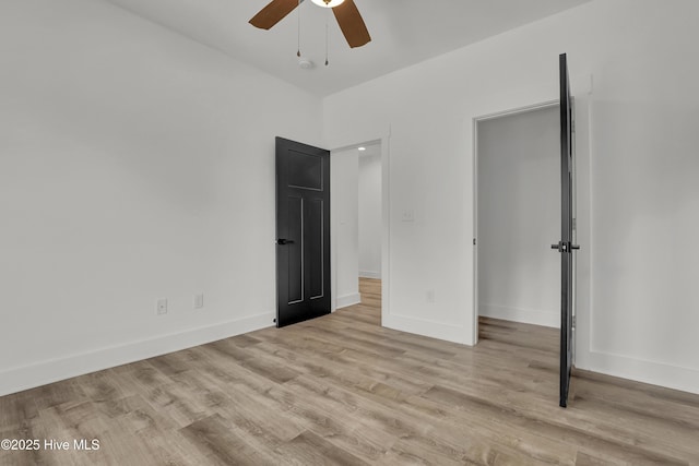 232 Shell Dr, Sneads Ferry, NC 28460 - unfurnished bedroom featuring light wood-style flooring, baseboards, and ceiling fan