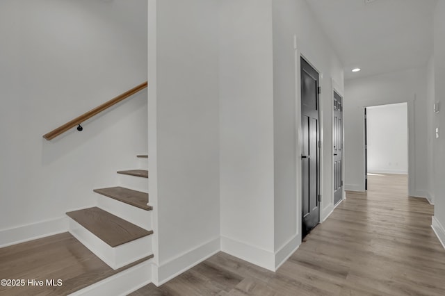 232 Shell Dr, Sneads Ferry, NC 28460 - stairway with wood finished floors, baseboards, and recessed lighting