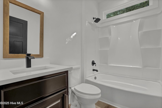 232 Shell Dr, Sneads Ferry, NC 28460 - full bath with toilet, vanity, shower / bathtub combination, and wood finished floors