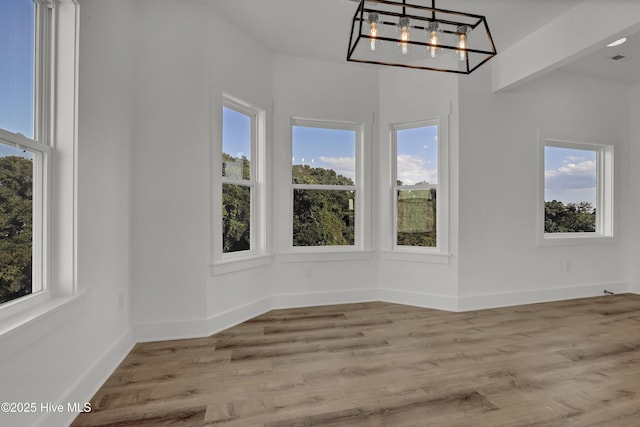 232 Shell Dr, Sneads Ferry, NC 28460 - unfurnished sunroom featuring plenty of natural light and a chandelier