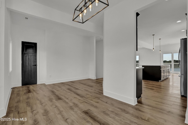 232 Shell Dr, Sneads Ferry, NC 28460 - unfurnished dining area with baseboards, wood finished floors, and recessed lighting
