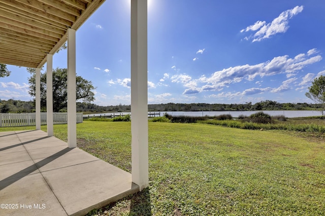 232 Shell Dr, Sneads Ferry, NC 28460 - view of yard featuring a water view and a patio area