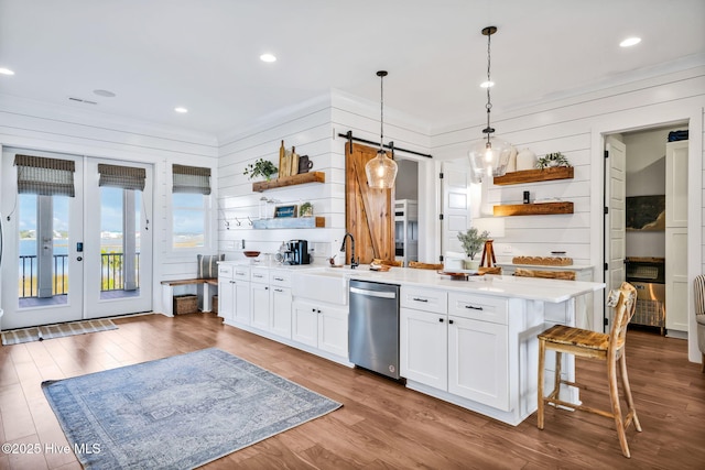 1753 New River Inlet Rd, North Topsail Beach, NC 28460 - kitchen with open shelves, stainless steel dishwasher, white cabinetry, and recessed lighting