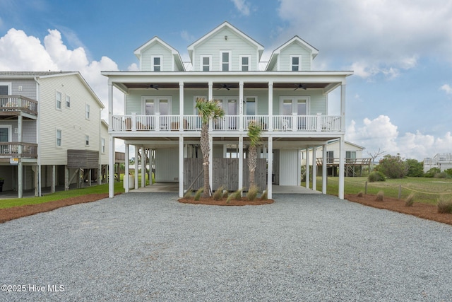 1753 New River Inlet Rd, North Topsail Beach, NC 28460 - beach home featuring a ceiling fan, a carport, and driveway