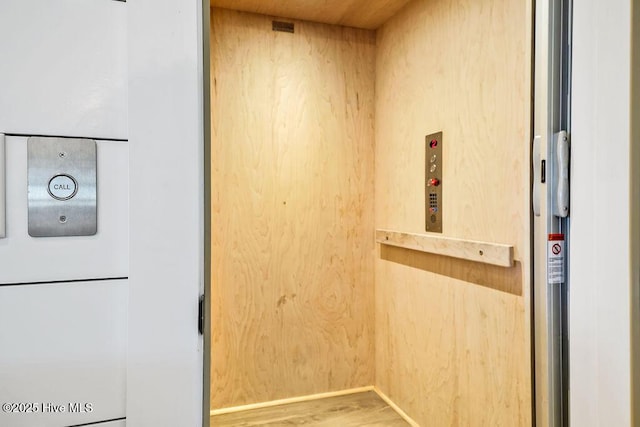 1753 New River Inlet Rd, North Topsail Beach, NC 28460 - elevator featuring wood finished floors